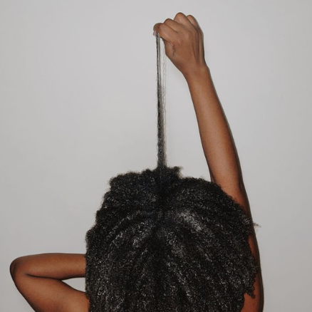 The Science Behind Shrinkage: Embracing the Magic of Your Natural Hair